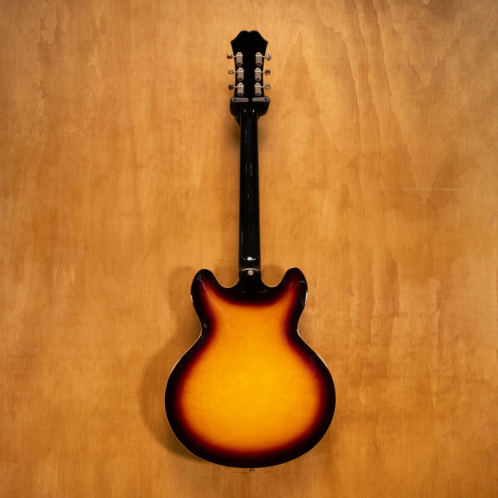 Epiphone Casino electric guitar in vintage sunburst finish, showcasing its hollow body and classic design.