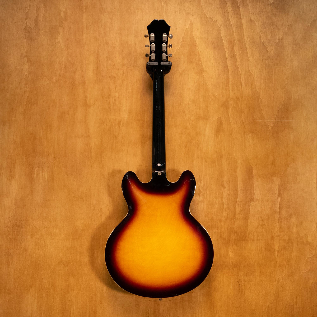 Epiphone Casino electric guitar in vintage sunburst finish, showcasing its hollow body and classic design.