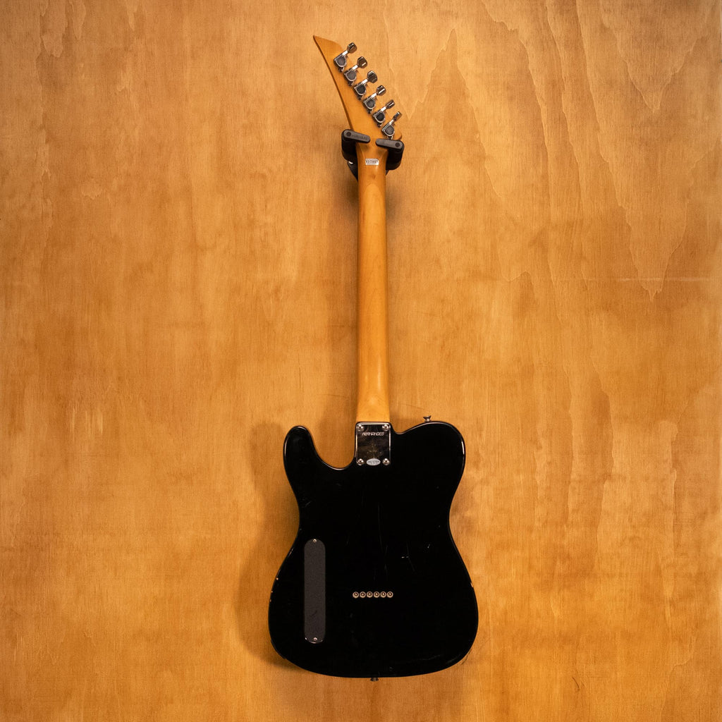 Fernandes T-Syle TEJ-45 electric guitar with sunburst finish, solid body, and six strings, shown on a stand.