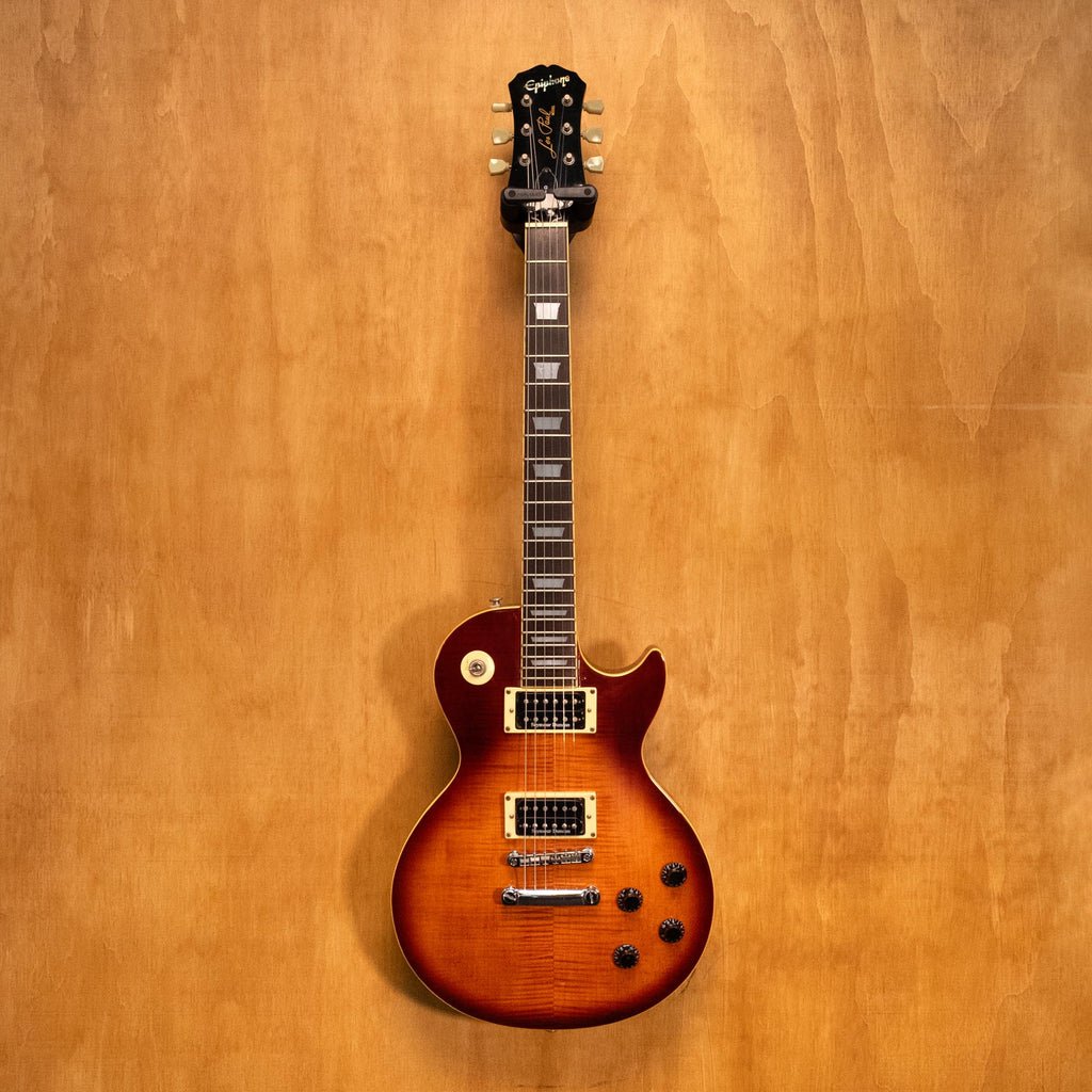Preloved Epiphone Les Paul Standard electric guitar with sunburst finish, showcasing dual humbucker pickups and classic body shape.