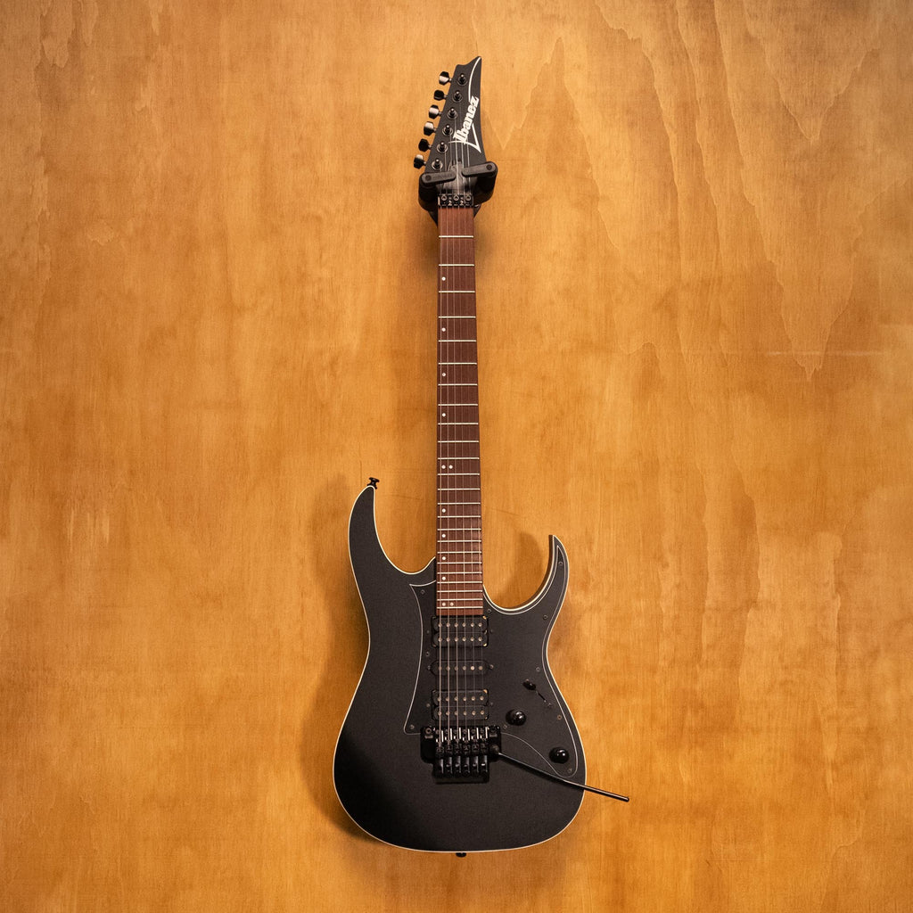 Ibanez RG450B-WK electric guitar in weathered black with sleek body and six strings, showcasing its modern design and hardware.
