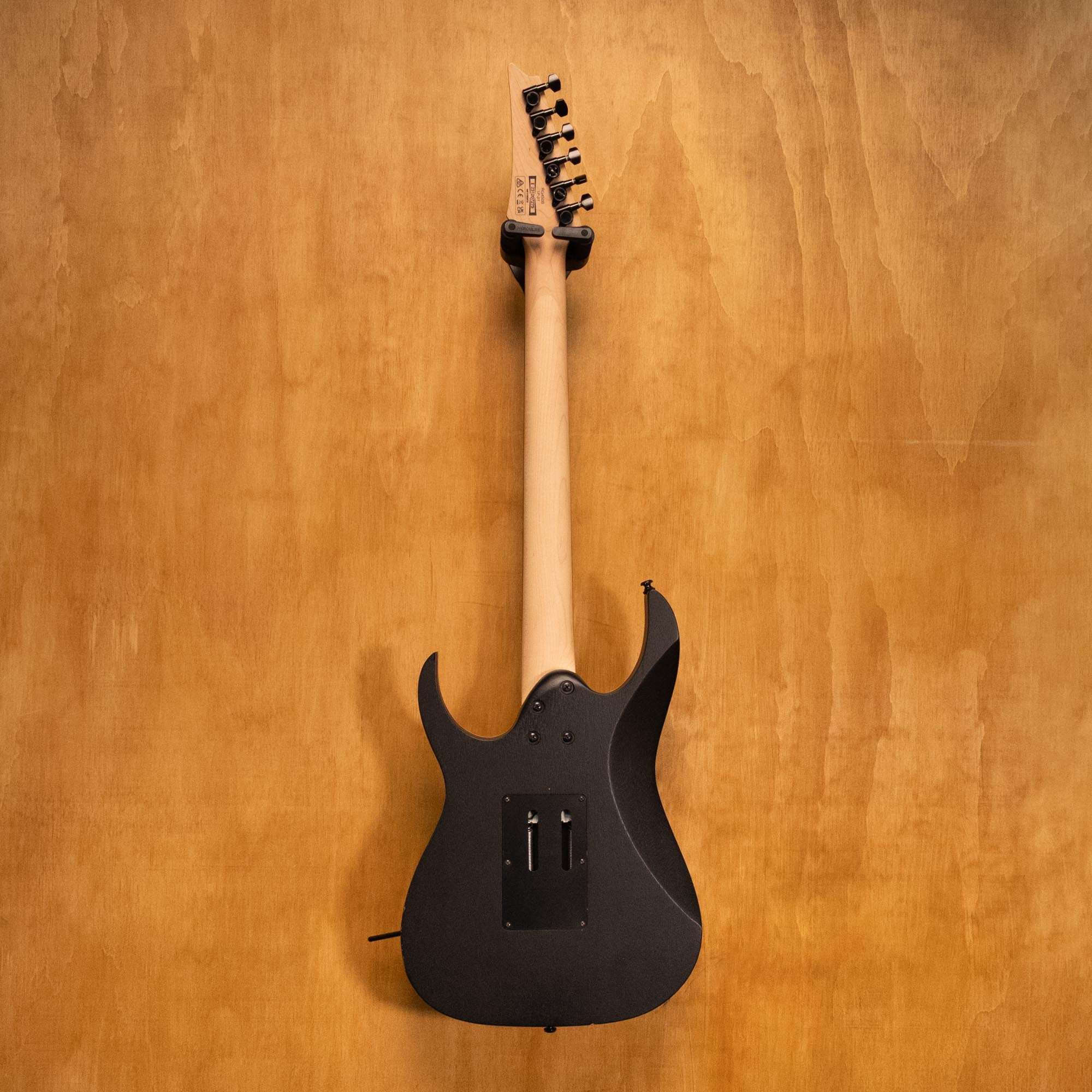 Ibanez RG450B-WK electric guitar in weathered black with maple fretboard and dual humbucker pickups, showcasing its sleek design.
