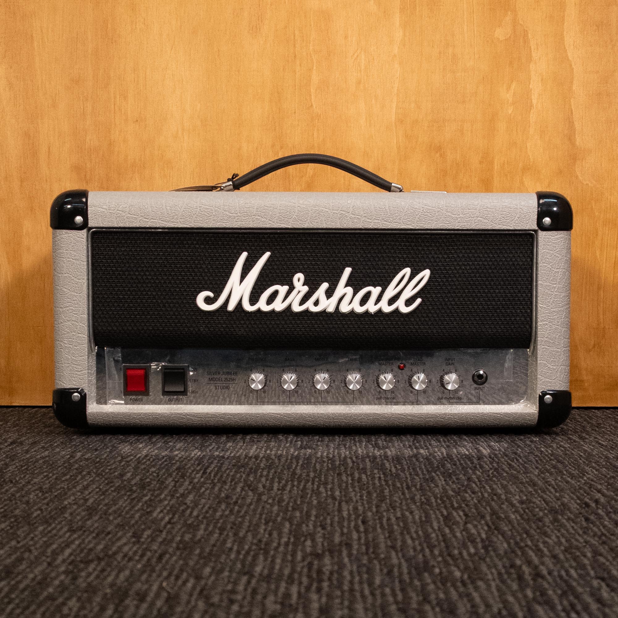 Marshall 2525H 20W Jubilee guitar amp head with control knobs and vintage finish, used condition, matching amplifier for guitar playing