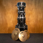 Yamaha Gigmaker 5-piece drum kit with cymbals, black finish, including bass, snare, toms, and hi-hat for versatile drumming.