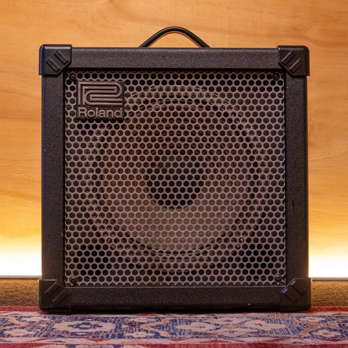 Roland CUBE 30 guitar amplifier, compact black electric guitar amp with control knobs and input jack, pre-loved condition.