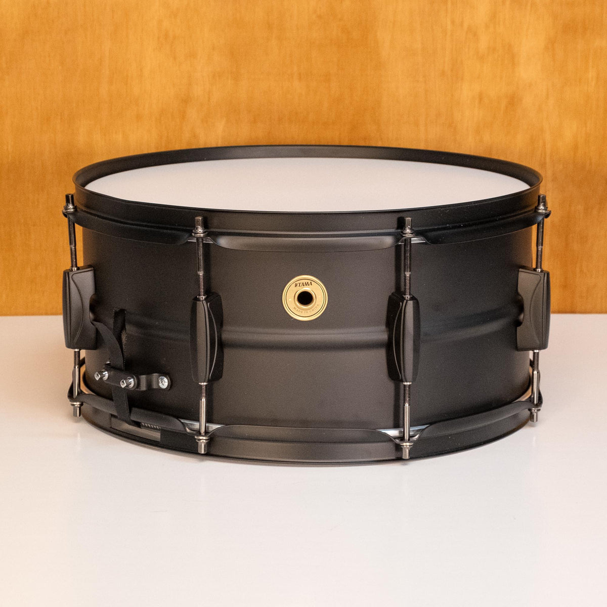 Preloved Tama Metal Works 14x6.5 snare drum with chrome finish and detailed drum heads, showcasing its sturdy construction.