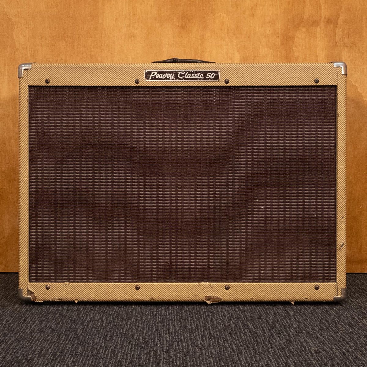 Peavey Classic 50 2x12 guitar amplifier combo, vintage style with control knobs and speaker grille, used condition.