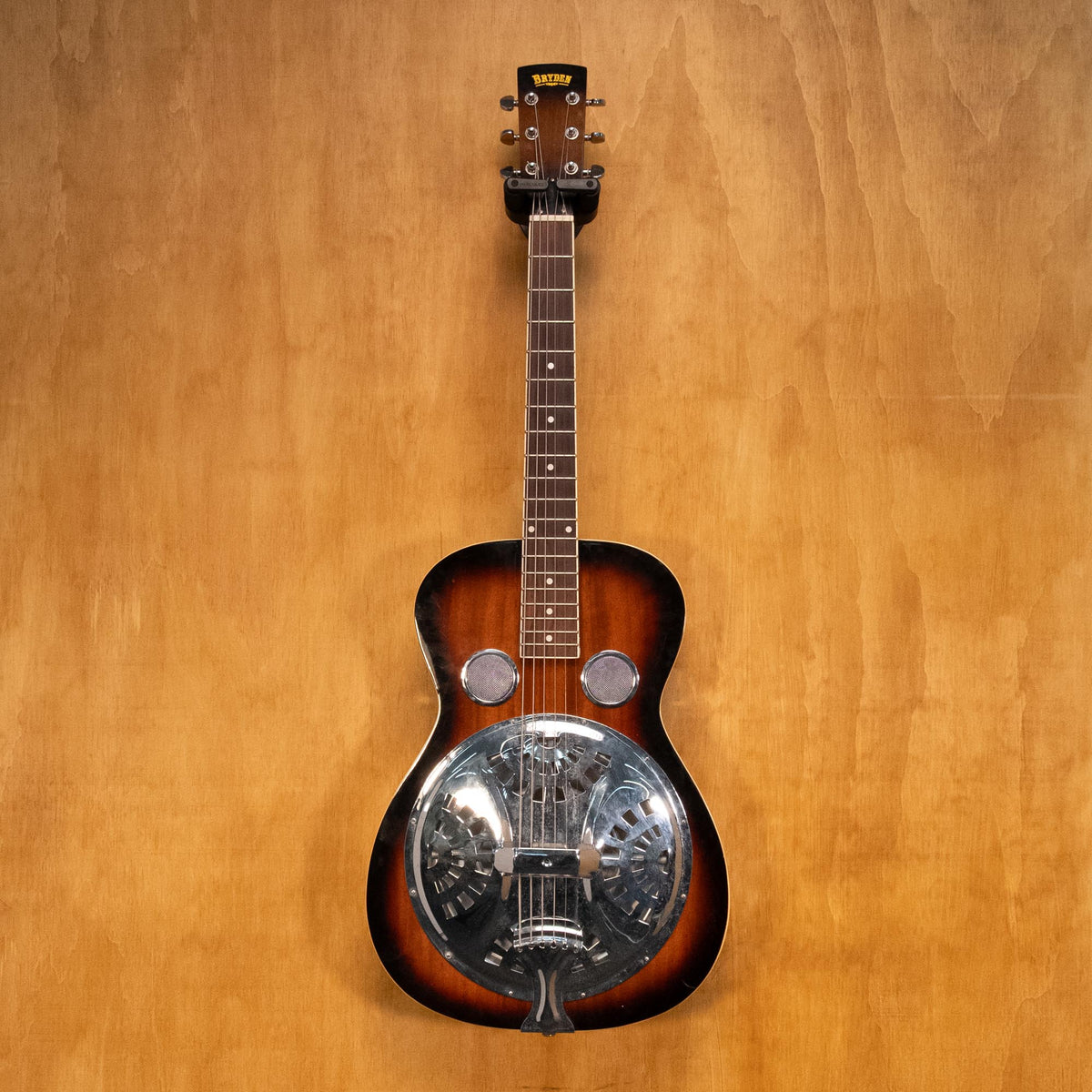 Preloved Bryden Resonator Guitar (BRYDEN477) with a metal resonator, wooden body, and traditional folk and bluegrass design.