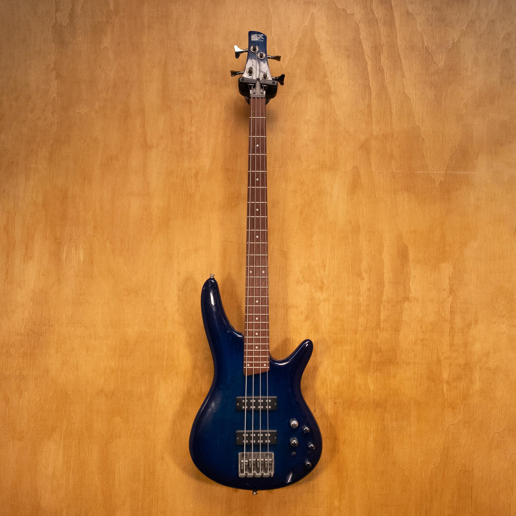 Ibanez SR370E bass guitar in blue burst finish, featuring a sleek body, four strings, and modern design.