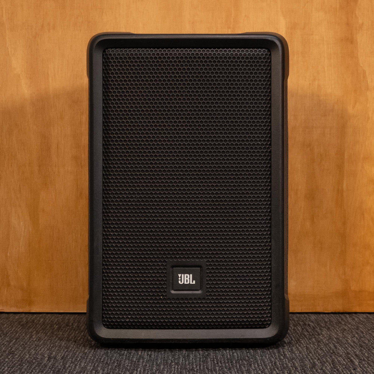 JBL IRX108BT powered speaker with black enclosure and control panel, used for portable sound reinforcement.