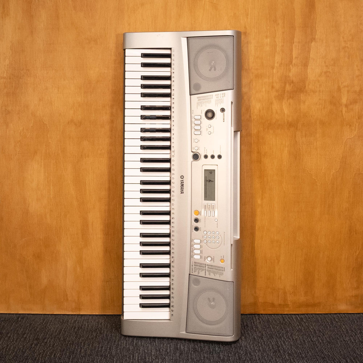 Yamaha PSR-E313 61-note keyboard with control panel and keys, shown in a close-up shot.