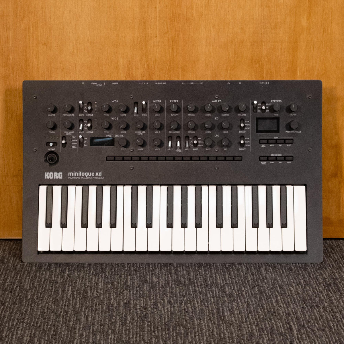 Korg Minilogue XD polyphonic analogue synthesizer keyboard with knobs and keys, front view showcasing controls and display.