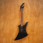 Jackson Kelly electric guitar with EMG pickups, black finish, shown with double-cutaway body and chrome hardware.