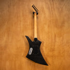 Preloved Jackson Kelly electric guitar with EMG pickups, featuring a sleek body and modern hardware, displayed in a well-lit setting.