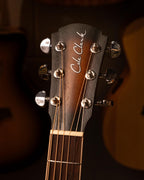Cole Clark Studio FL1EC acoustic guitar with blackwood face, back, and sides, featuring a sunburst finish and natural wood grain.
