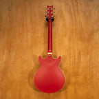Ibanez AMH90 hollow body electric guitar in cherry red flat finish, displaying its sleek design and craftsmanship.