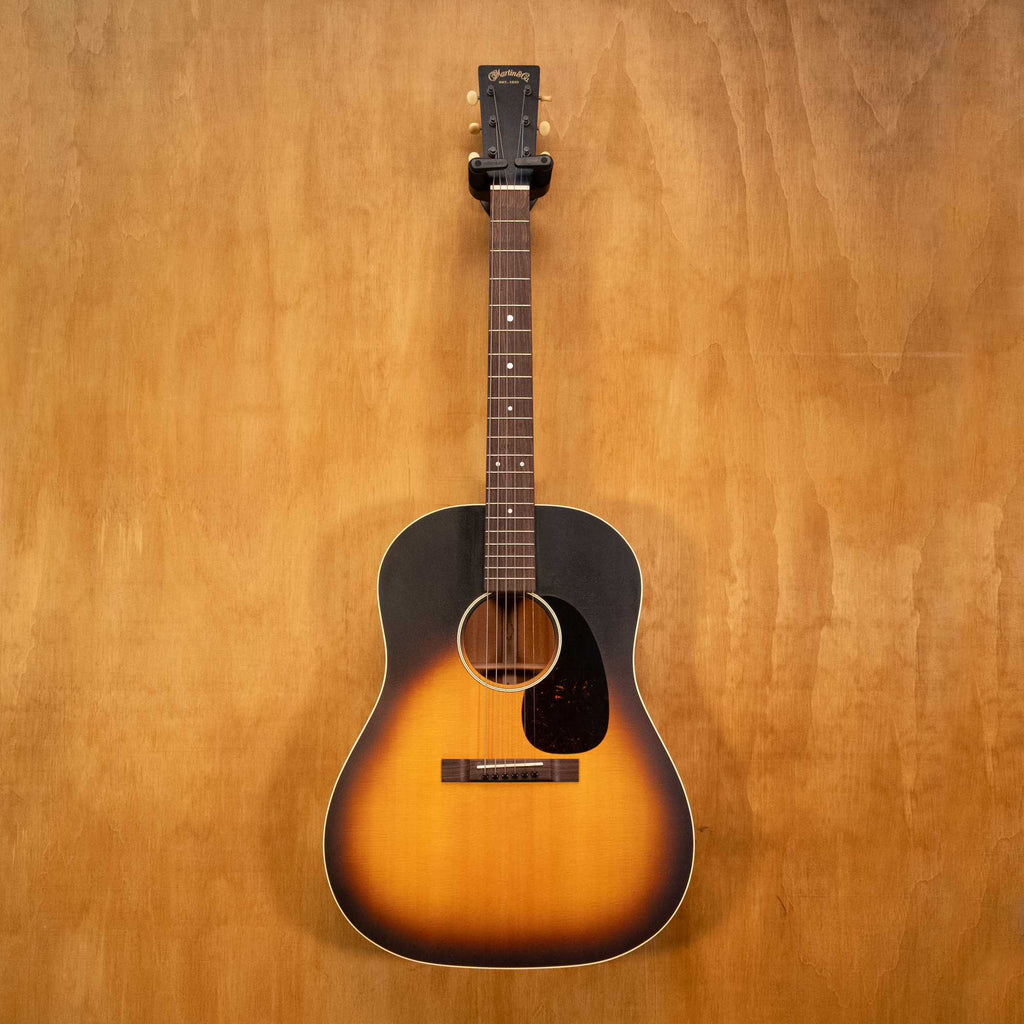 Martin DSS-17 Whiskey Sunset acoustic guitar with a rich finish, featuring a dreadnought body and detailed wood grain.