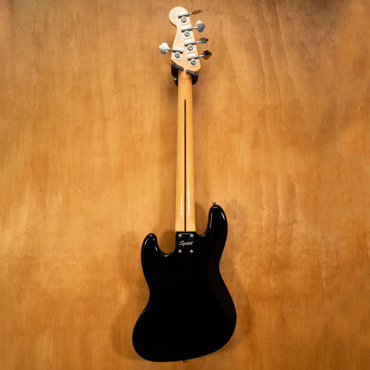 Preloved Squier Classic Vibe '70s 5-string Jazz Bass Guitar with sunburst finish and vintage-style hardware, shown from front angle.