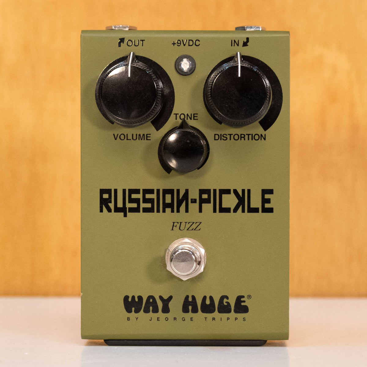 Preloved Way Huge Russian Pickle guitar effects pedal with colorful controls and vintage design, mounted on a pedalboard.