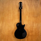 Left-handed Epiphone Les Paul electric guitar in ebony finish, showing the body, neck, and hardware details.