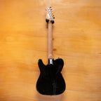 Preloved SX T-style electric guitar in black, showcasing its sleek body and classic design details.