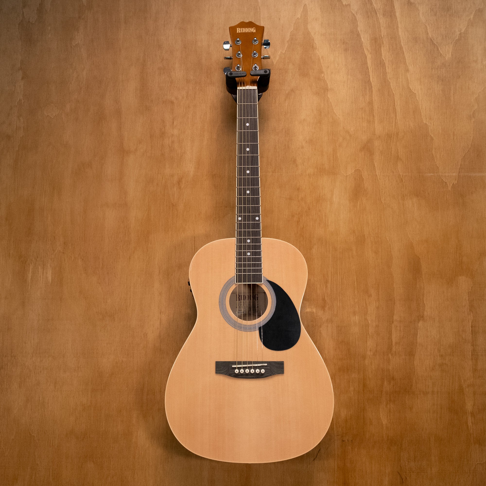 Preloved Redding RED34E 3/4 acoustic guitar with pickup, showcasing its wood body and fretboard, ideal for young players.