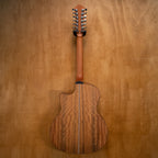Gilman 12-string acoustic guitar with cutaway and pickup, showing the wooden body and fretboard, preowned and ready to play.