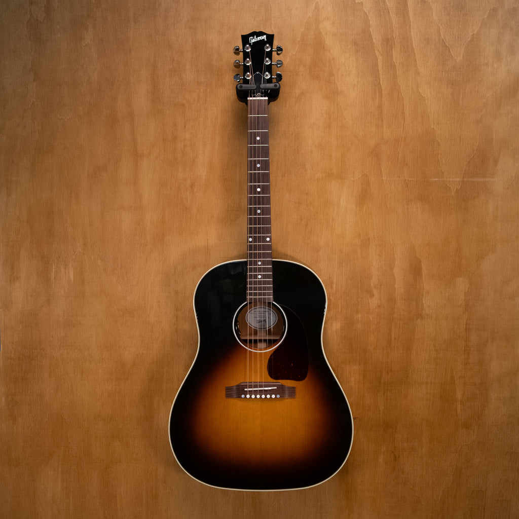 Gibson '50s J45 Original acoustic guitar in vintage sunburst finish, preowned, with a wooden body and classic design.
