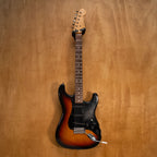 Fender '62 Reissue Stratocaster electric guitar made in Japan, featuring a sunburst finish and vintage-style tremolo bridge.