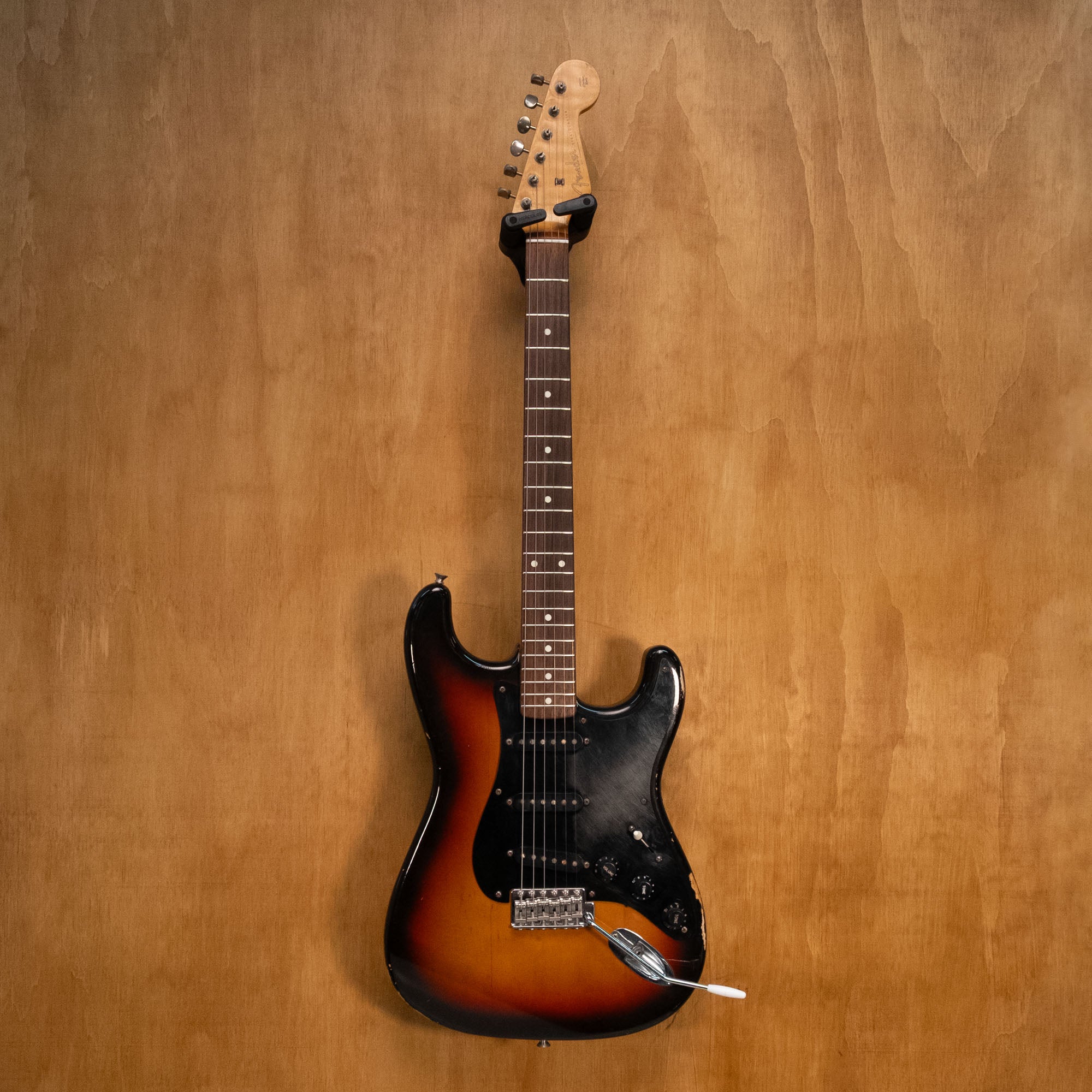 Fender '62 Reissue Stratocaster electric guitar made in Japan, featuring a sunburst finish and vintage-style tremolo bridge.