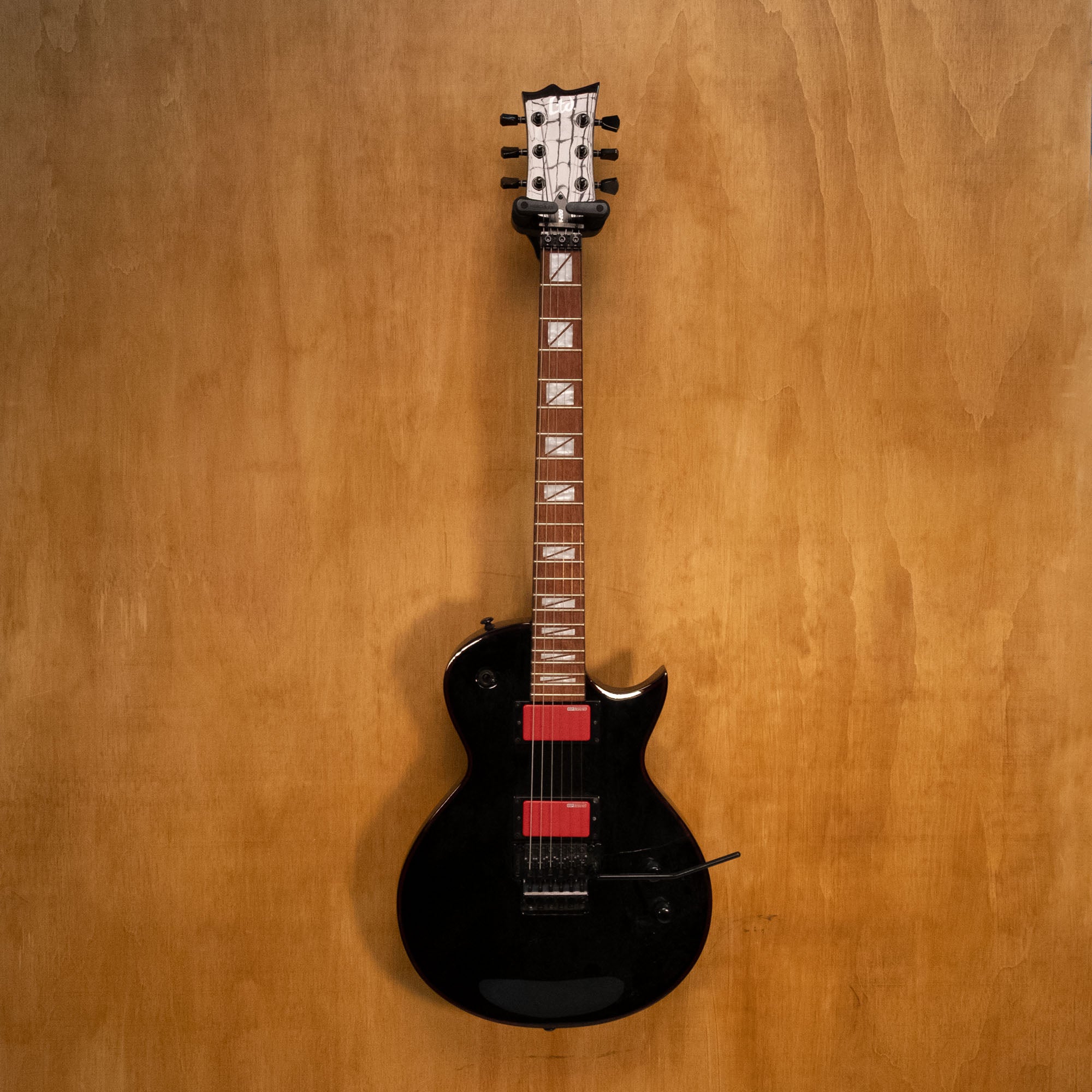 Preloved ESP LTD Gary Holt GH-200 signature electric guitar with black finish and sleek body, shown from front angle.