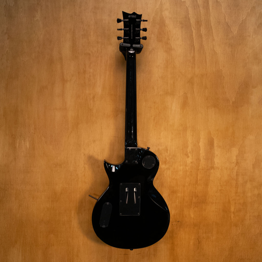 Preloved ESP LTD Gary Holt GH-200 Signature Electric Guitar with sleek black body and chrome hardware, close-up view of the instrument.