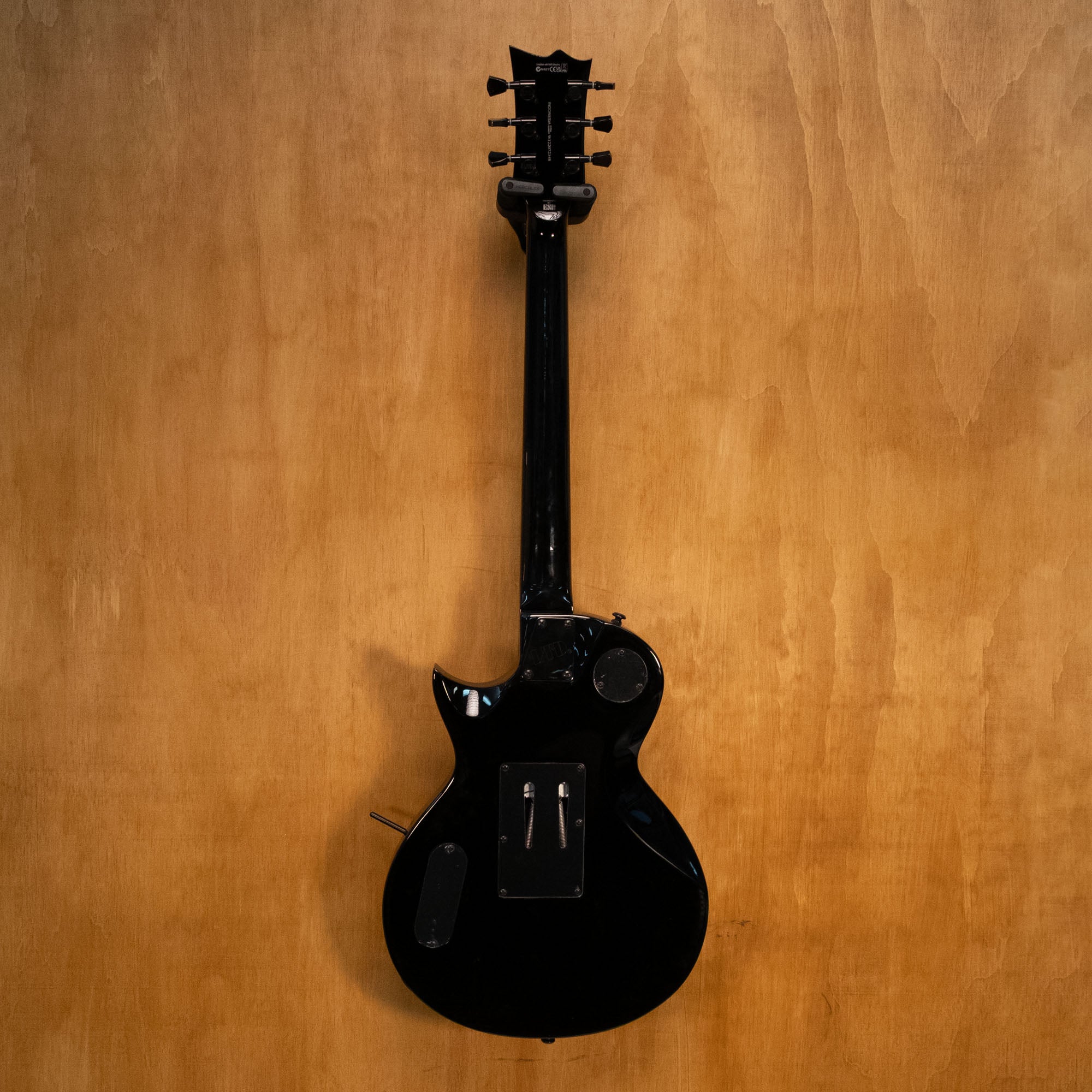 Preloved ESP LTD Gary Holt GH-200 Signature Electric Guitar with sleek black body and chrome hardware, close-up view of the instrument.