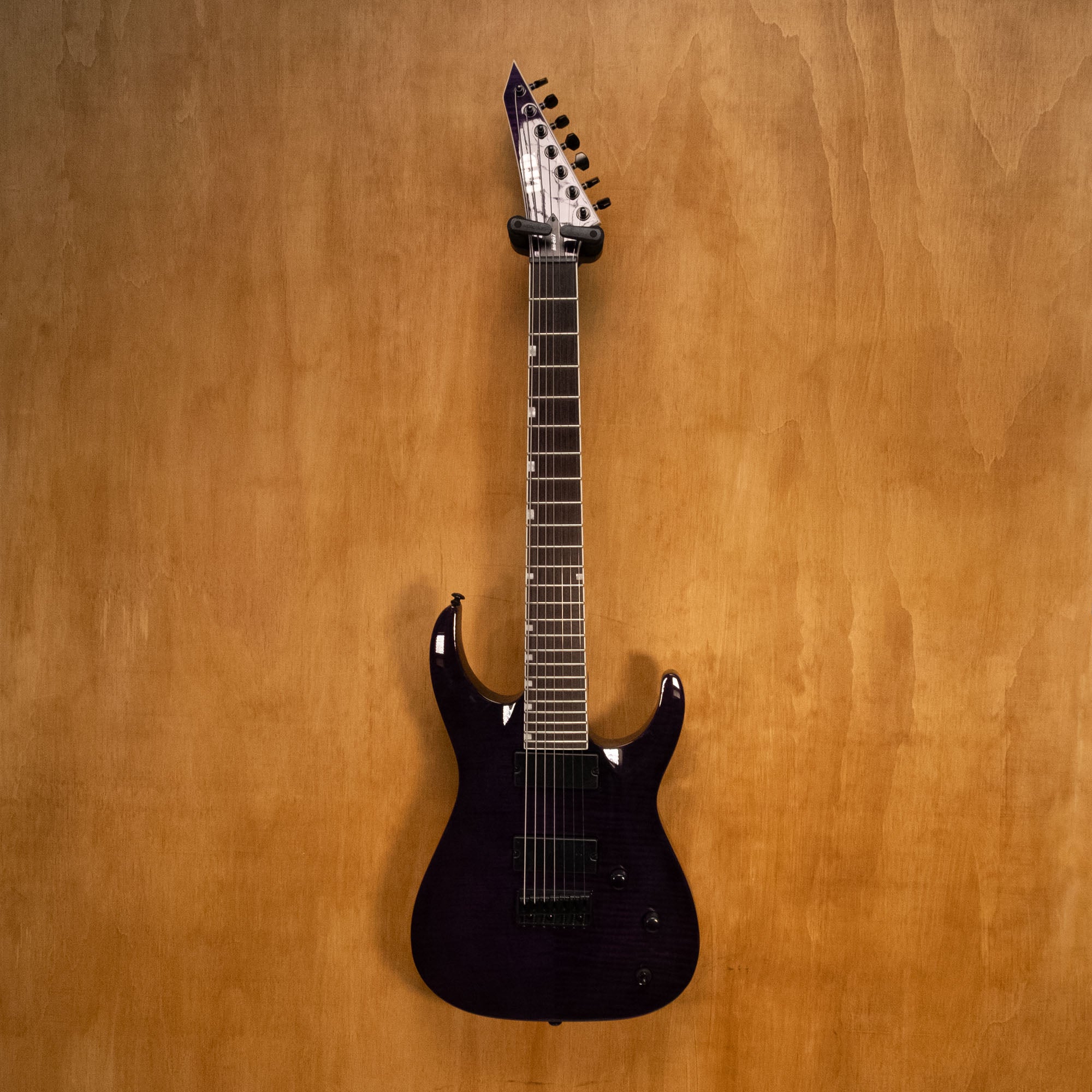 ESP LTD Sir Hedley Signature 200 Series 7-string electric guitar with sleek black finish and modern design.