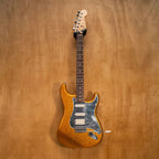 Fender HSS Stratocaster electric guitar with gold sparkle finish, MIM construction, and classic guitar features.