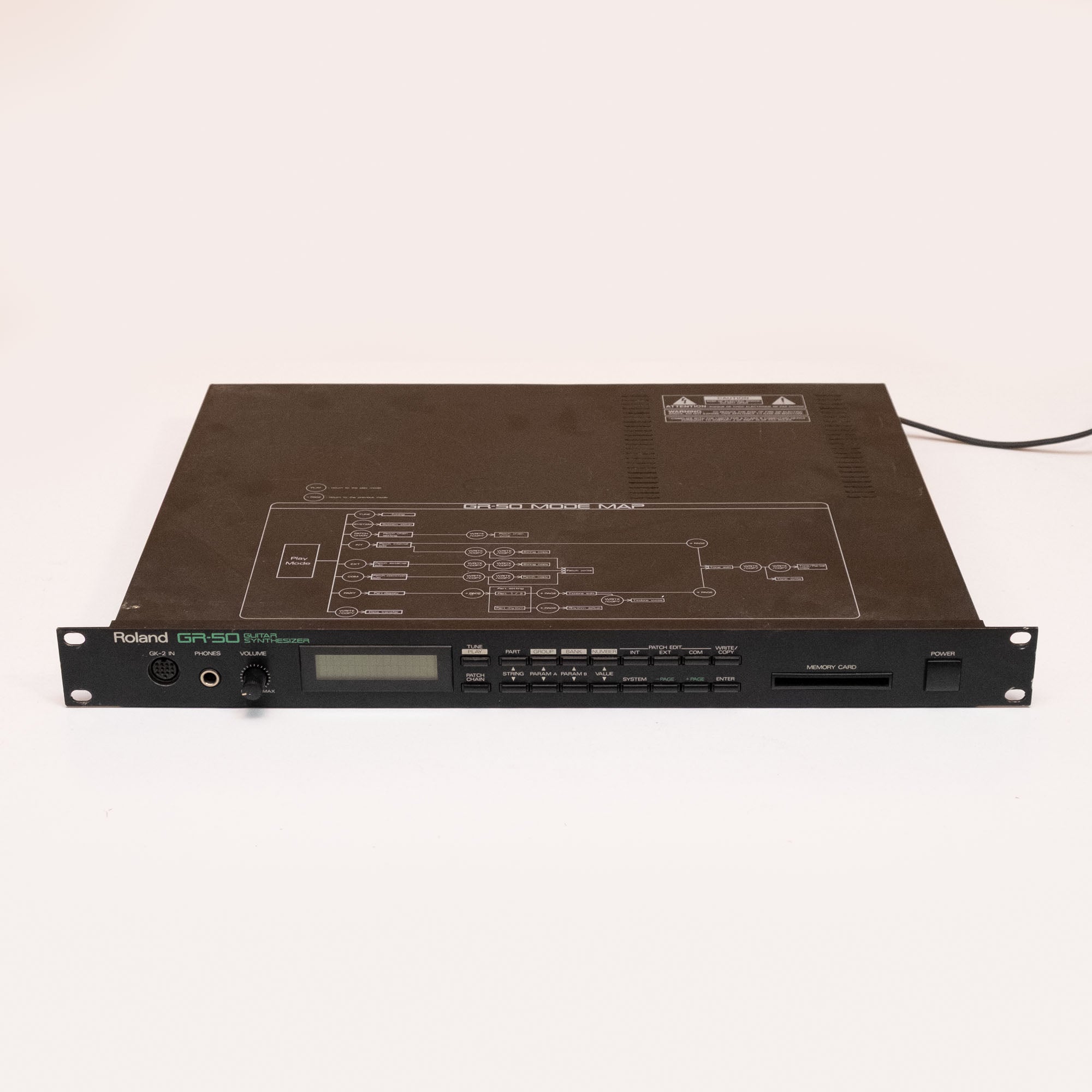 Roland GR-50 guitar synthesizer effect pedal, preowned, with knobs and input/output jacks visible in the image.