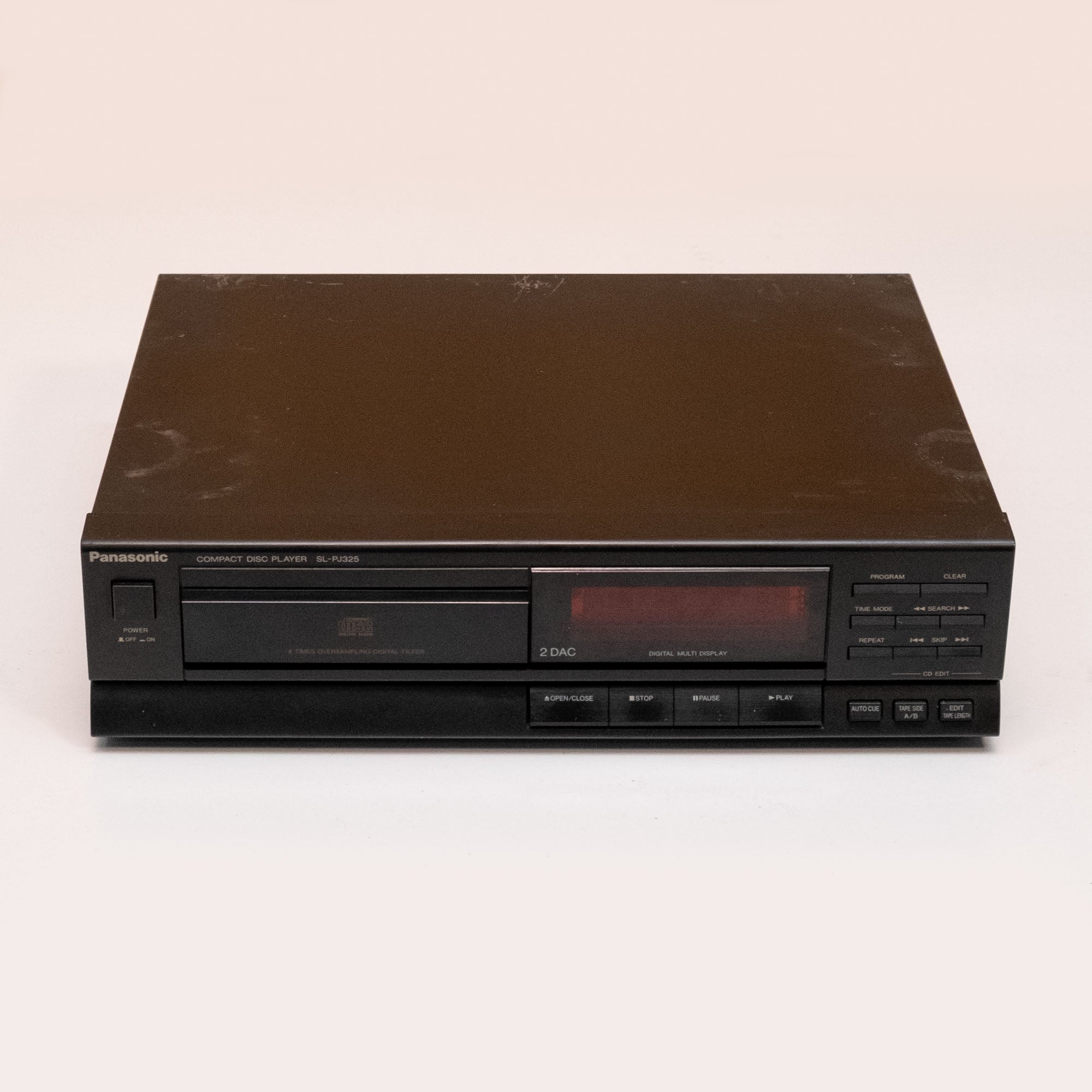 Panasonic SL-PJ325 single CD player with DAC display, vintage '90s MIJ outboard audio device, shown in the image.