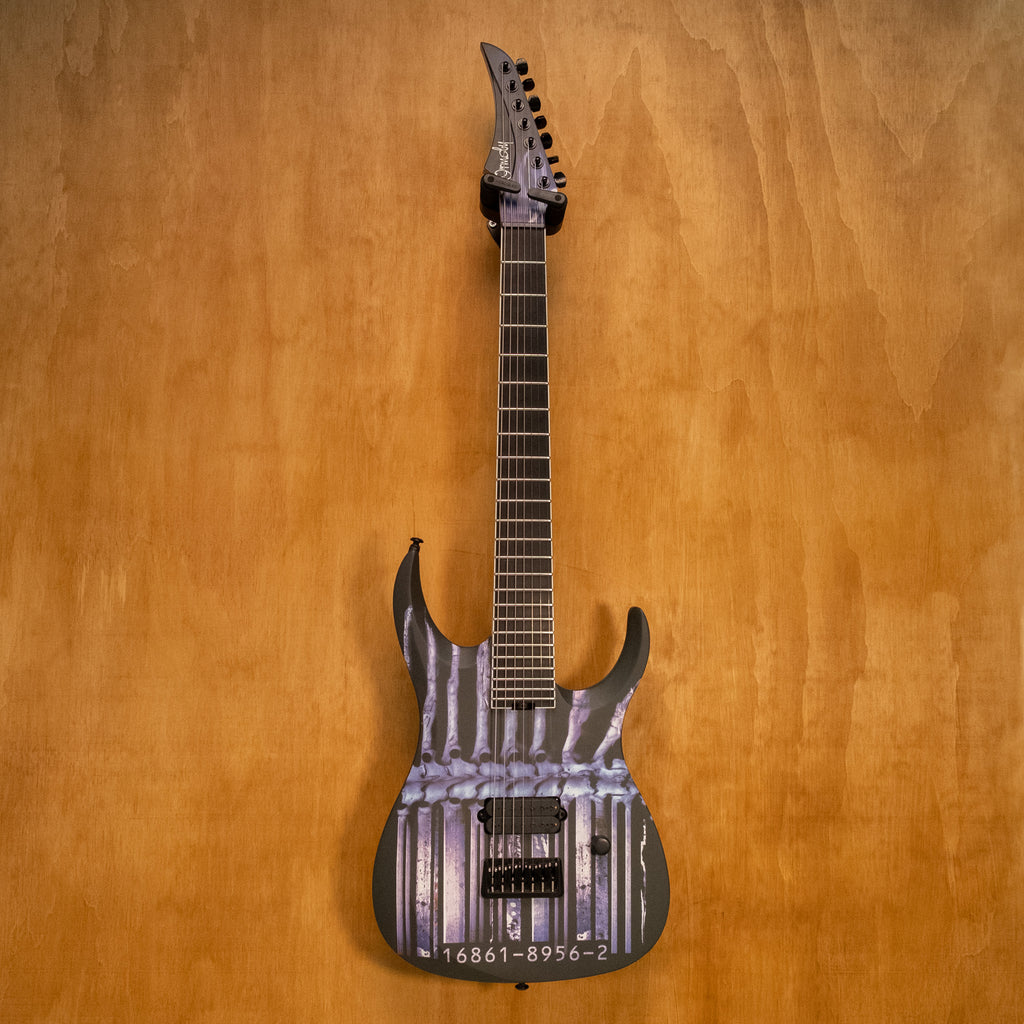 Ormsby Artist Series Dino Cazares DC GTR Demanufacture 7-string electric guitar with sleek design and detailed body artwork.