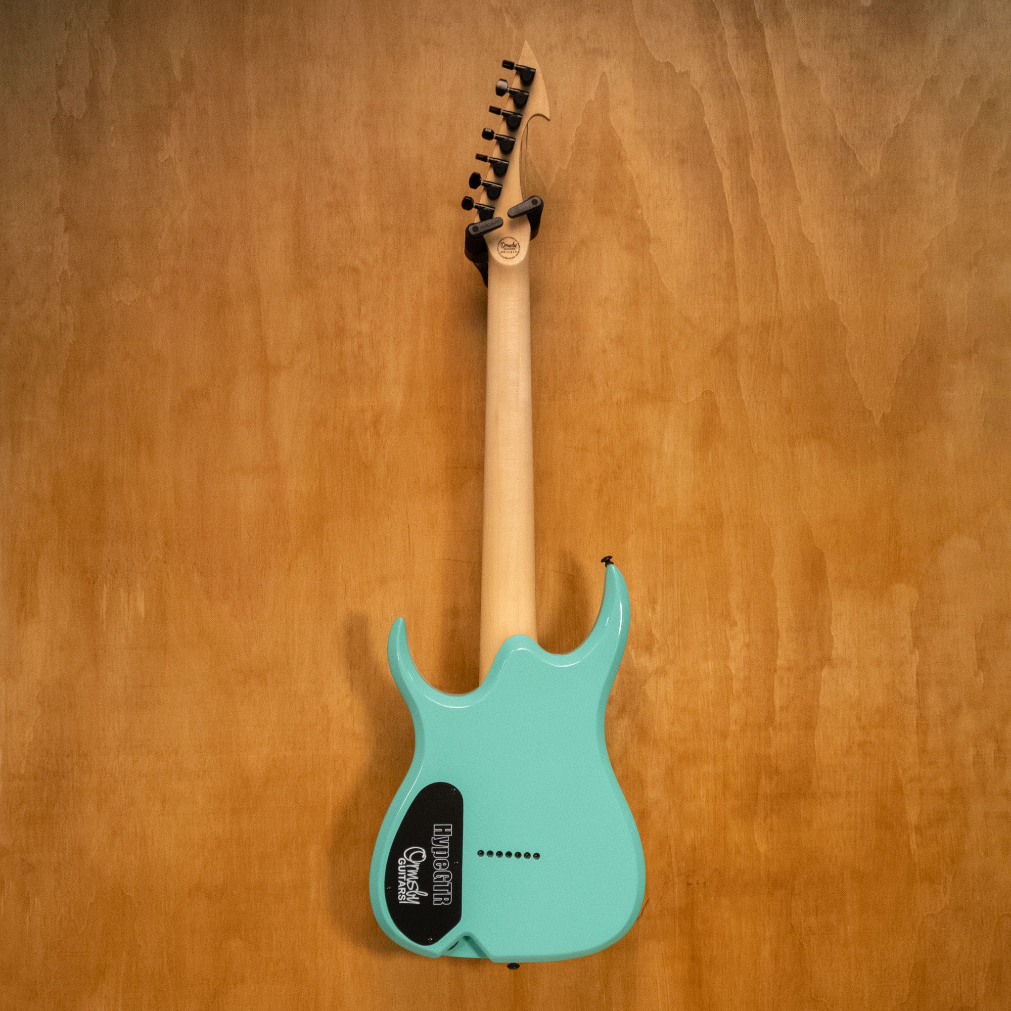 Ormsby Hype Run 18 Standard Scale 7-string electric guitar in seafoam finish with sleek body and modern design.