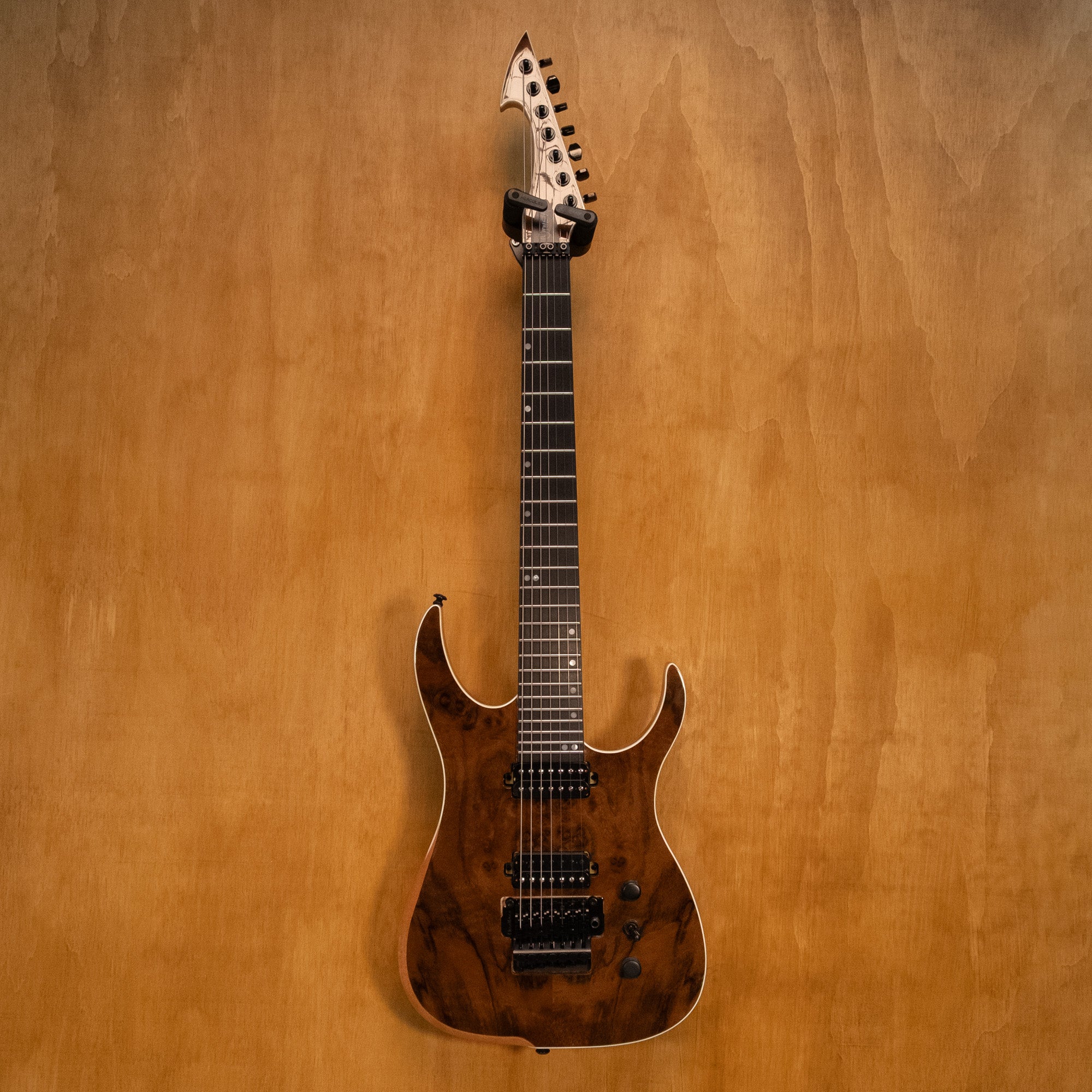 Ormsby Hype Run 18 Standard Scale 7-string electric guitar in walnut finish with sleek body and modern design.