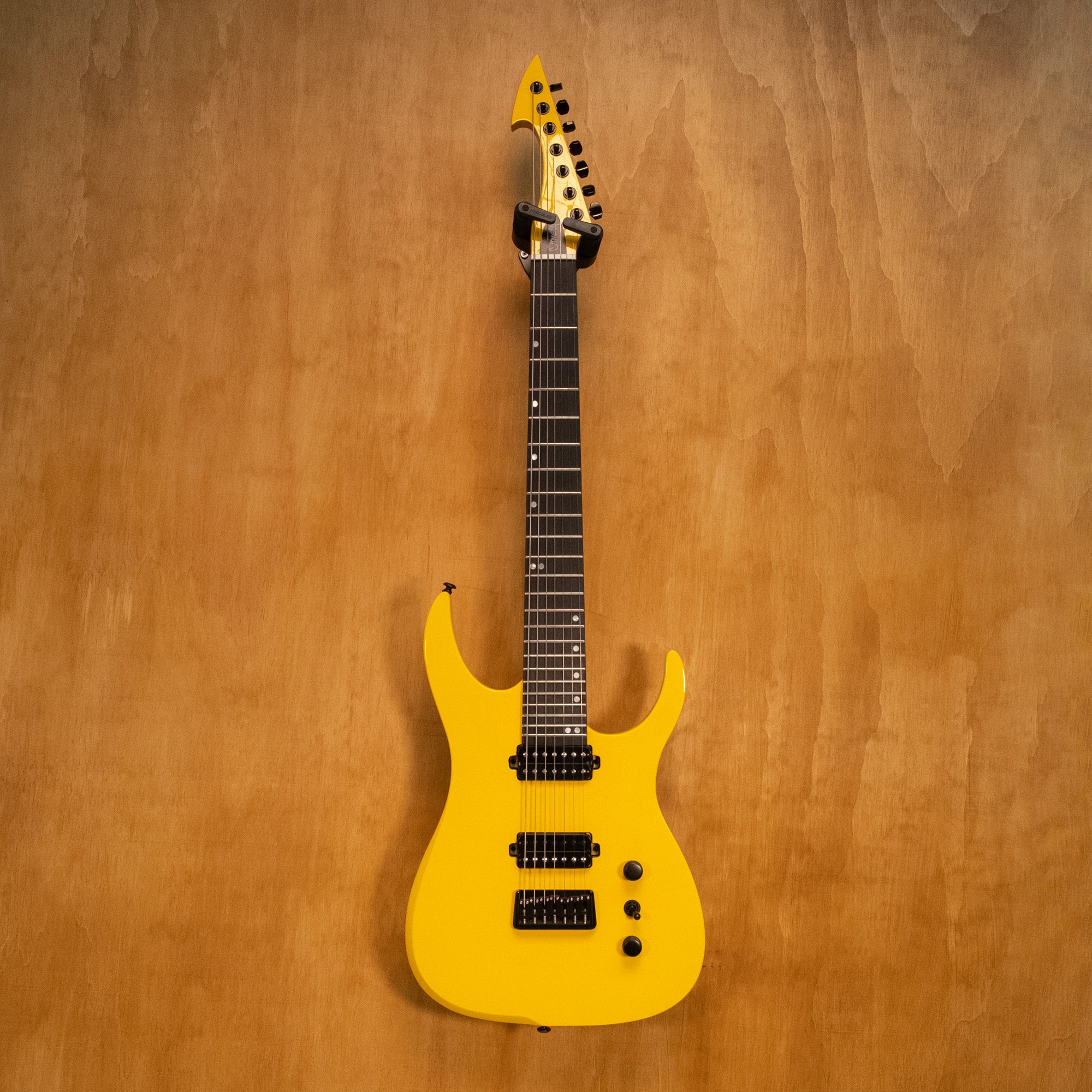 Ormsby Hype Run 18 Standard Scale 7-string electric guitar in High Alert finish, showing the guitar's body and neck details.