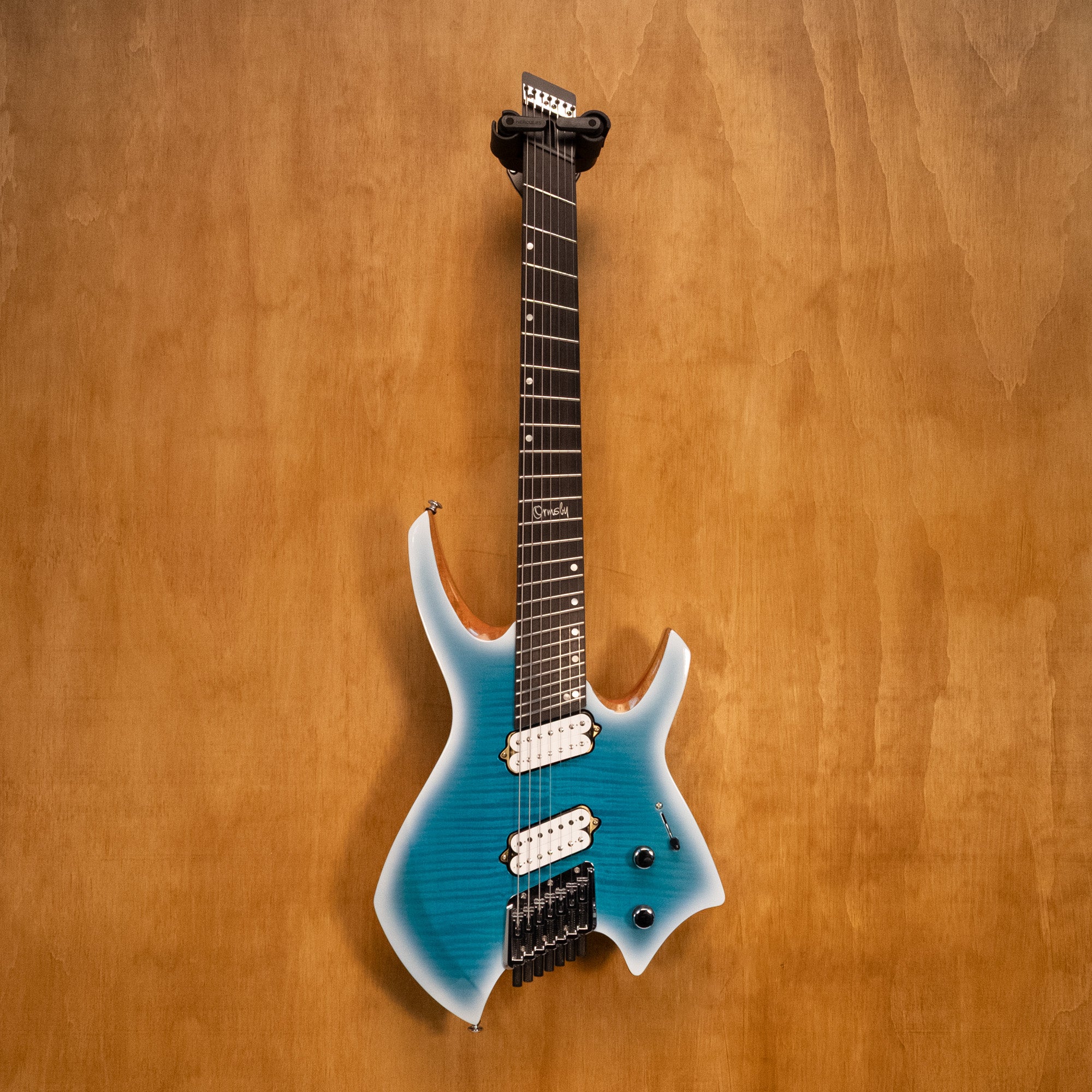 Ormsby Goliath Run 17 multi-scale 7-string electric guitar in Ice Cool finish, featuring sleek design and detailed hardware.