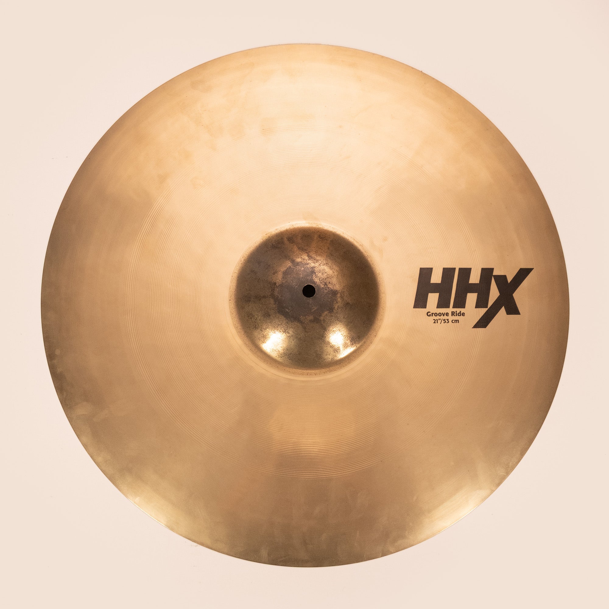 Preloved Sabian HHX 21-inch Groove Ride Cymbal with intricate grooves and polished finish, designed for versatile cymbal sounds.