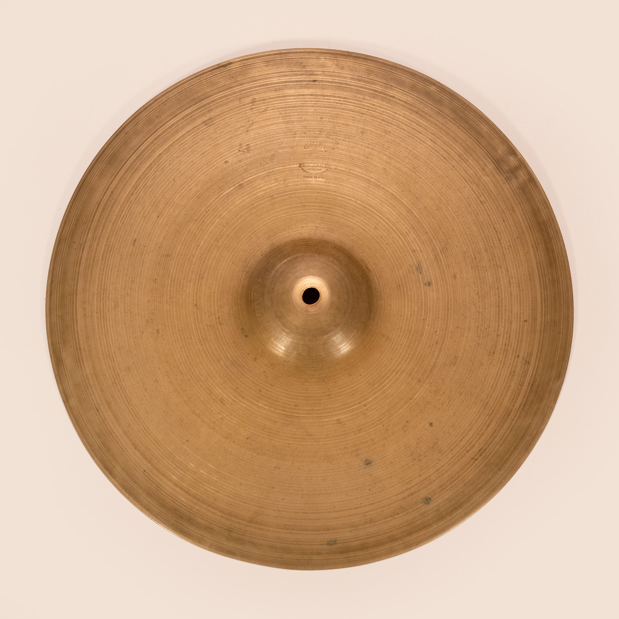 Zildjian Avedis 14-inch Trans Stamp single hi-hat cymbal from 1946-1953, with a vintage look and well-used surface.
