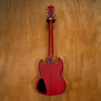 Epiphone SG electric guitar in Worn Cherry finish with black pickguard and dual humbucker pickups, displayed on a stand.