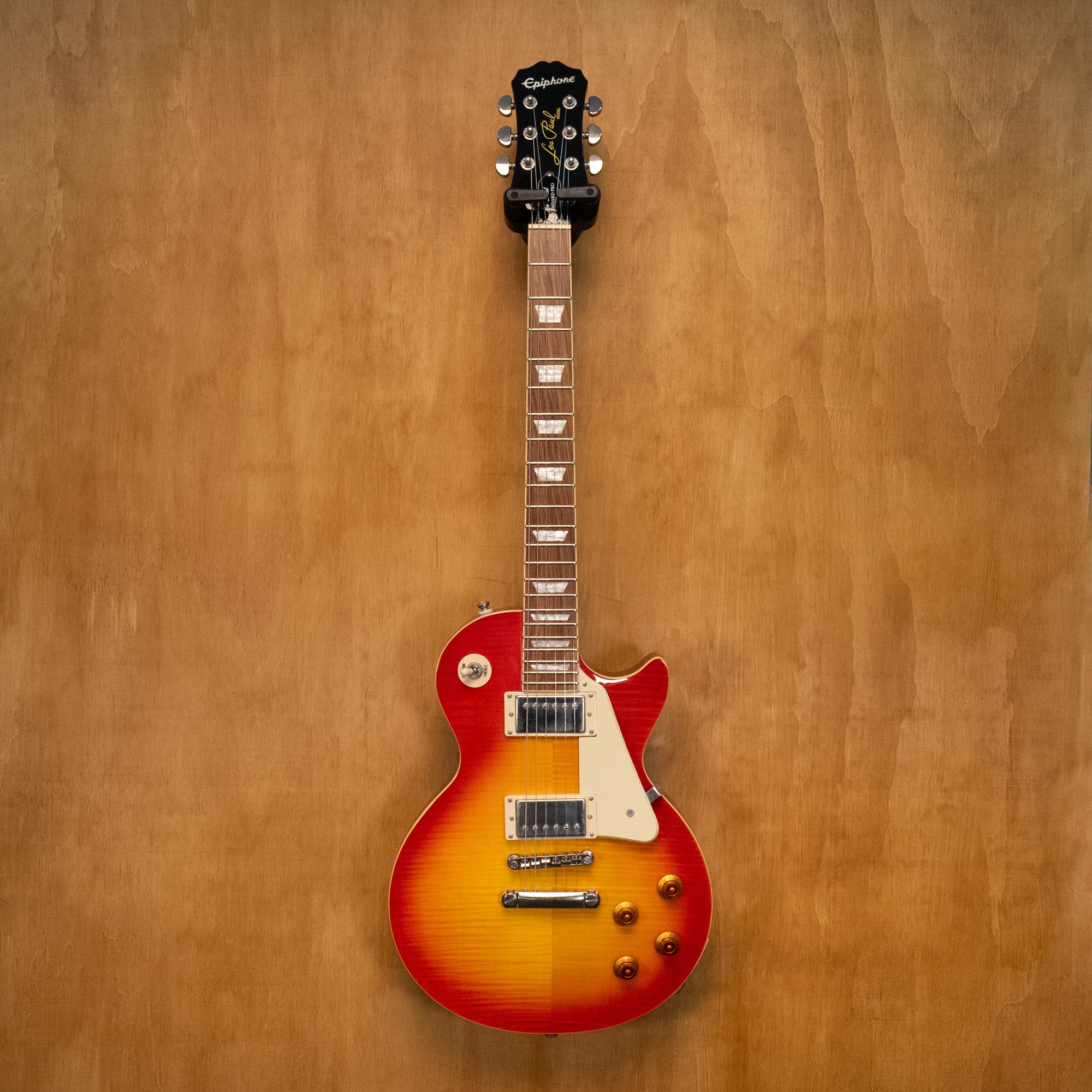 Epiphone Les Paul Standard Plus Top Pro electric guitar in Heritage Cherry Sunburst finish, showing the body and neck details.