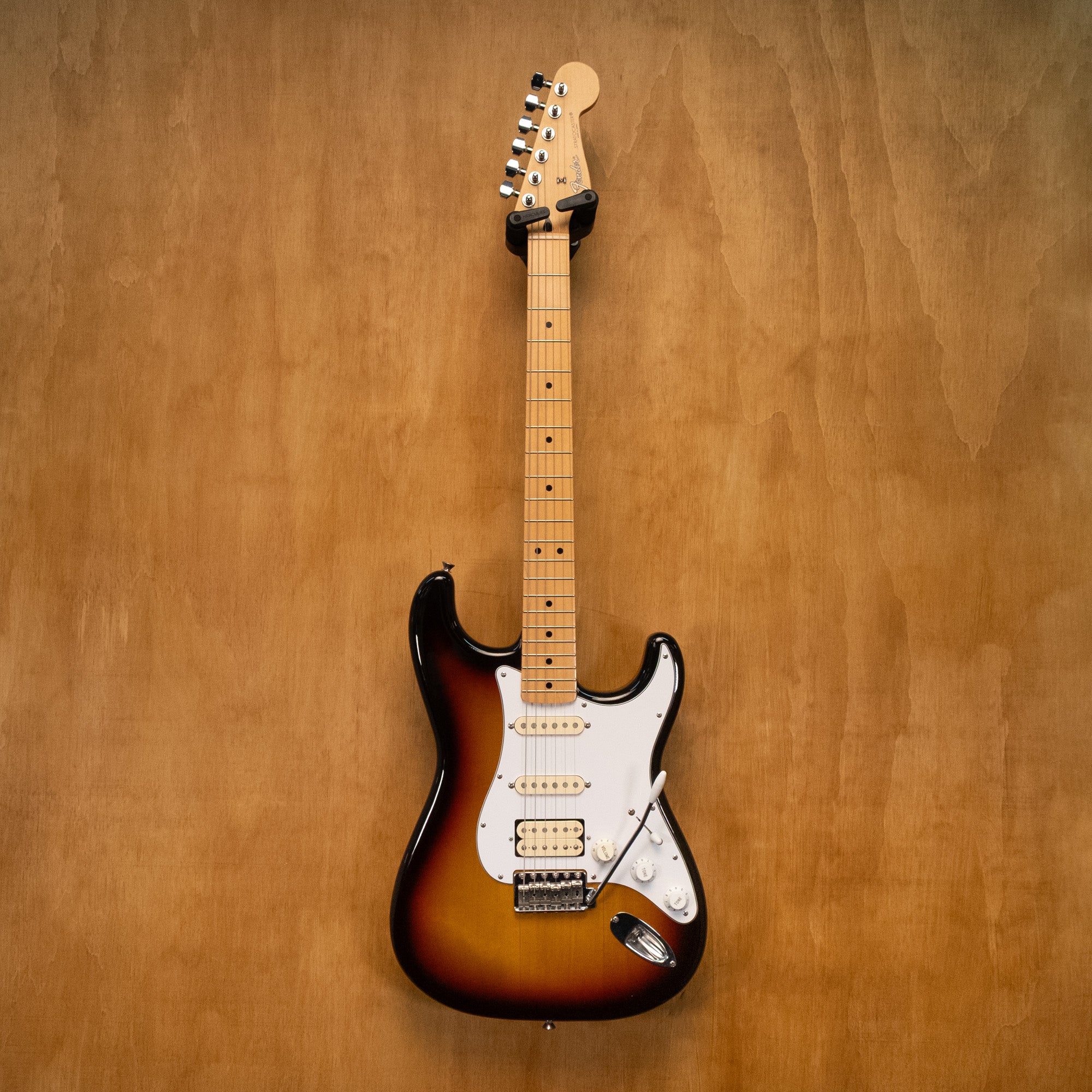 Fender Stratocaster ST-STD HSS electric guitar in 3-tone sunburst finish with maple neck, made in Japan, year 2007.
