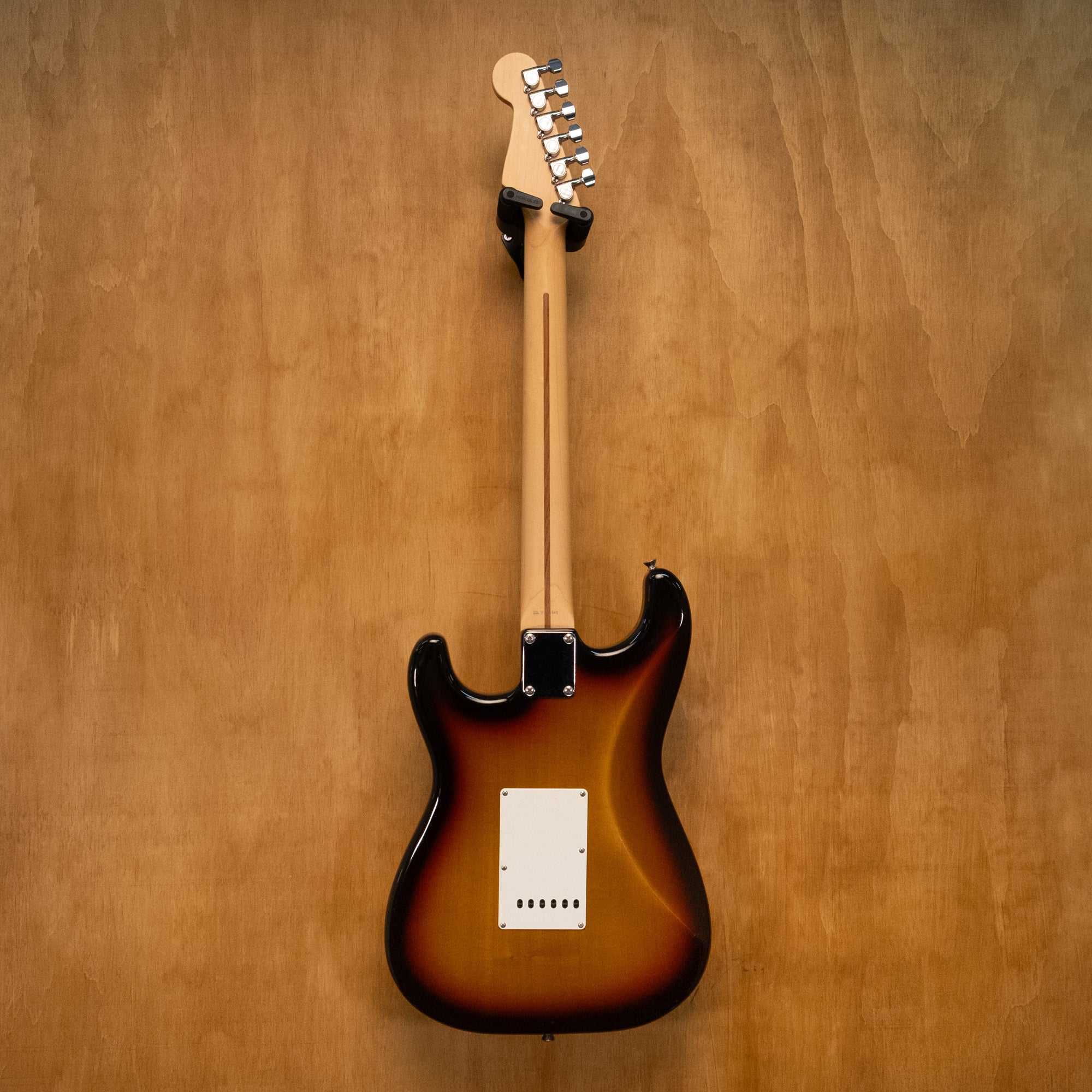 Fender Stratocaster ST-STD HSS electric guitar in 3-tone sunburst finish, made in Japan, showing the body and pickups.