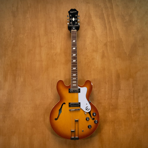 Epiphone Riviera E-360TD electric guitar in royal tan finish, showcasing its body, neck, and hardware details.