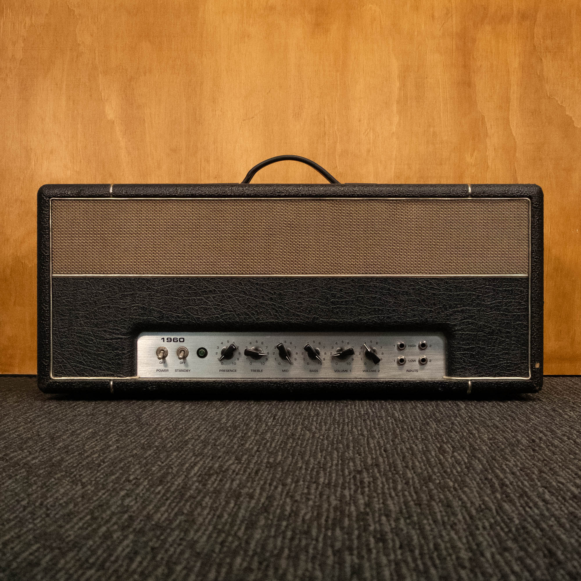 Bugera 1960 Heavy modded guitar amplifier head with KT88 tubes, shown in a close-up image highlighting controls and vintage design.